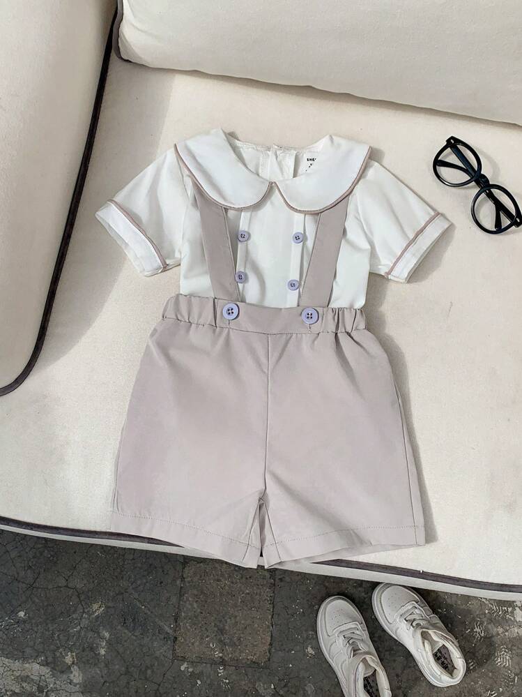 SHEIN 2 piezas Conjunto para bebé/niño pequeño con top de manga corta blanco con cuello y decoración de botones, shorts a juego con tirantes, estilo simple y fresco, adecuado para niños - Multicolor - Ver 4