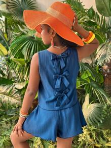 Conjunto de 2 piezas para niña preadolescente con top azul casual de cuello redondo con textura y lazo en la espalda, y shorts a juego