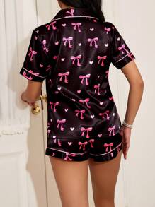 SweetSlumber Conjunto de pijama de camisa y short para mujer con estampado de corazón y lazo - Negro - Ver 2