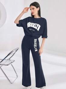 Mulvari 2pcs/Set Women Letter Print Round Neck Tee And Flared Pants, Casual Women's Summer Slogan Print Dropped Shoulder T-Shirt And Casual Pants 2pcs/Set, Casual Outfits Tracksuit 2 Pieces Lounge Set, Suitable For Walking/Sports/Back To School & Everyday Casual Wear Contains Cotton, Quick Sweat Absorption - Navy Blue - View 9