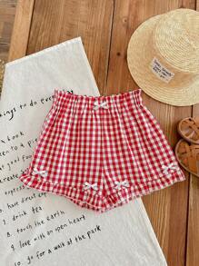 SHEIN EZwear Shorts casuales de mujer con acento de lazo blanco y volante a cuadros rojos, adecuado para el verano
