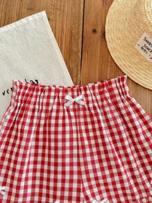 SHEIN EZwear Shorts casuales de mujer con acento de lazo blanco y volante a cuadros rojos, adecuado para el verano