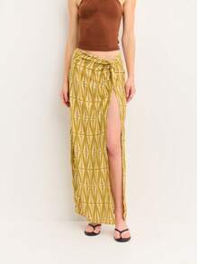 Nöista 大胆印花裹身黄色半身裙，开衩至大腿。轻盈面料，完美契合海滩度假、圣若昂风情和假日氛围。 - 綠色 - 查看 4