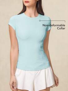 OutZeal Maglietta tecnica sportiva da donna OutZeal, aderente, traspirante, in morbido tessuto in nylon, ideale per allenamenti e attività fisica