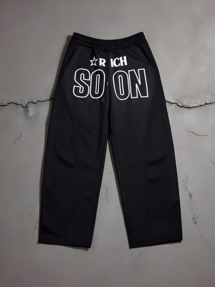 Manfinity EMRG Men's Black And White Summer Streetwear City Break Sweatpants,Collegiate Sports Loose Fit Puff Print Star Athletic Pants For Music Festival - Black - View 1