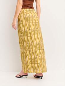 Nöista 大胆印花裹身黄色半身裙，开衩至大腿。轻盈面料，完美契合海滩度假、圣若昂风情和假日氛围。 - 綠色 - 查看 2