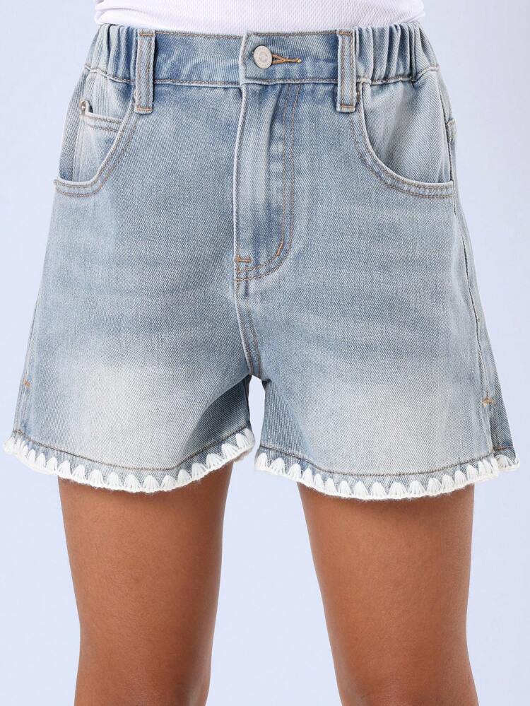 Pantaloncini in denim con finiture decorative a vita media