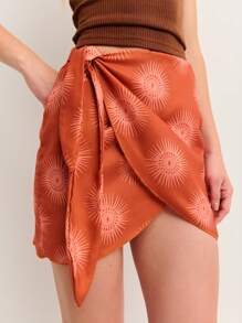 Nöista 提花裹身橙色迷你裙，侧边系带，旭日图案。丝滑质感，不对称剪裁，非常适合沙滩装、圣若昂造型，或大胆的美国独立日造型。