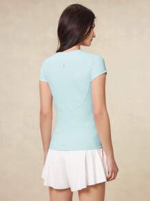 OutZeal Maglietta tecnica sportiva da donna OutZeal, aderente, traspirante, in morbido tessuto in nylon, ideale per allenamenti e attività fisica