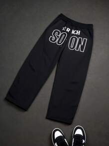 Manfinity EMRG Men's Black And White Summer Streetwear City Break Sweatpants,Collegiate Sports Loose Fit Puff Print Star Athletic Pants For Music Festival - Black - View 6