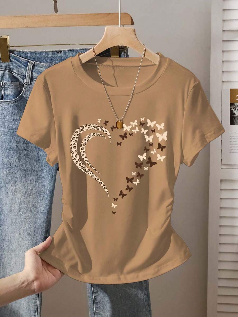 INAWLY Camiseta gráfica con estampado de mariposa y corazón con cintura ceñida, nuevos lanzamientos de verano para mujer - Caqui - Ver 1