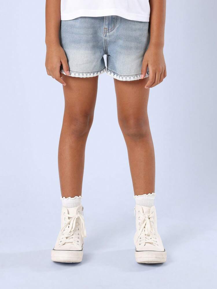Pantaloncini in denim con finiture decorative a vita media
