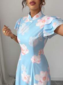 Elenzga Robe imprimée en mousseline asymétrique à col volant avec boutons à la taille et coupe évasée. Élégante, romantique et adaptée à la vie quotidienne et aux vacances. - Bleu ciel - Voir 7