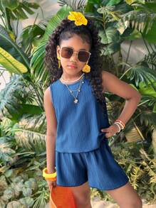 Conjunto de 2 piezas para niña preadolescente con top azul casual de cuello redondo con textura y lazo en la espalda, y shorts a juego