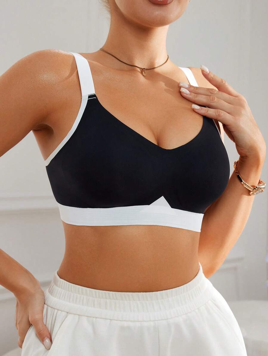 SHEIN Sujetador sin aros para mujer, sin costuras, con tirantes anchos, levantador de busto, con puntada de color contrastante para uso diario - Blanco y Negro - Ver 1