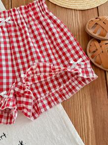 SHEIN EZwear Shorts casuales de mujer con acento de lazo blanco y volante a cuadros rojos, adecuado para el verano