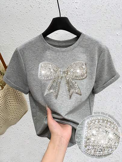 SHEIN Camiseta de manga corta con cuello redondo, decorada con lazo, lentejuelas y cristales para mujer, de moda de verano