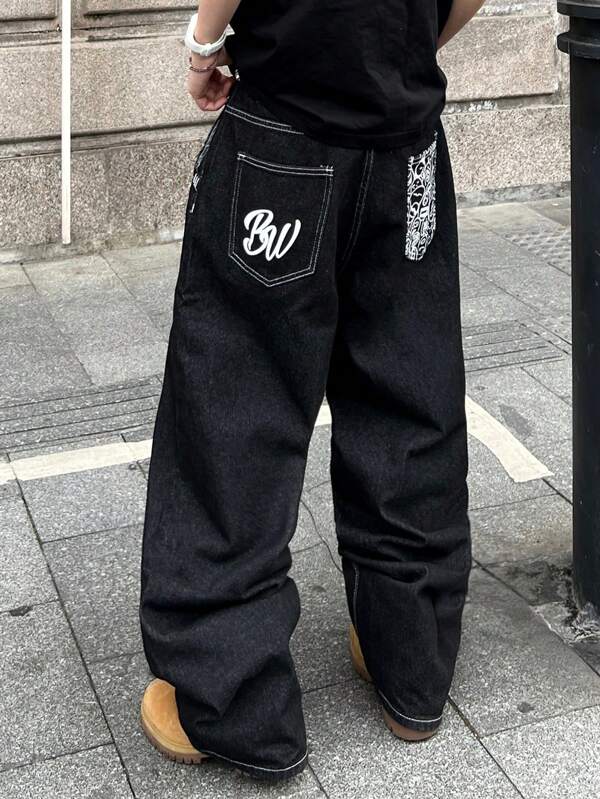 Manfinity Streetrush Jeans décontractés amples à jambes larges avec imprimé lettres pour hommes