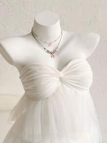 Sweetina Váy mini xếp nếp hở lưng lưới trắng quấn phía trước cho nữ, váy nghỉ dưỡng dễ thương giản dị - trắng - Xem 6
