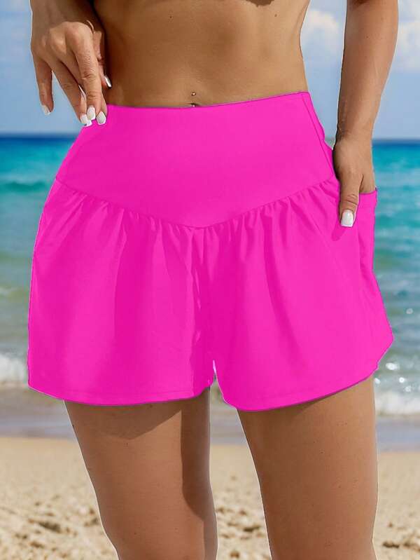 SHEIN Swim سروال قصير للنساء بتصميم بسيط ذو لون واحد ومزود بجيوب وطيات للإستخدام اليومي والشاطئ
