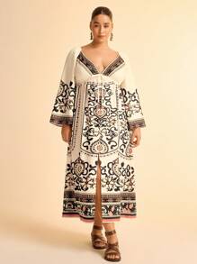 CAJUNI Vestido largo de estilo bohemio con estampado floral, cuello en V, de manga larga y holgado con calado para mujer de talla grande para vacaciones