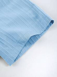 Manfinity Homme Ensemble 2 pièces pour hommes composé d'une chemise à manches courtes de couleur unie avec boutons devant et d'un short