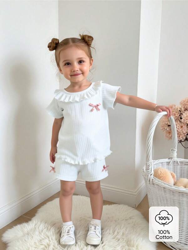 2pcs/Set Baby Girls Ruffle Collar Cap Sleeve Shirt With Bow Decor, Casual Cute Soft Cotton Rib Fabric White Outfit, Suitable For 4-7 Years Old, Comfortable And Skin-Friendly Cotton Material, Spring & Summer New Arrival, Suitable For Home Or Outdoor Activities