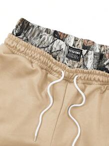 Manfinity EMRG Short décontracté pour hommes avec logo lettre brodé et cordon de serrage