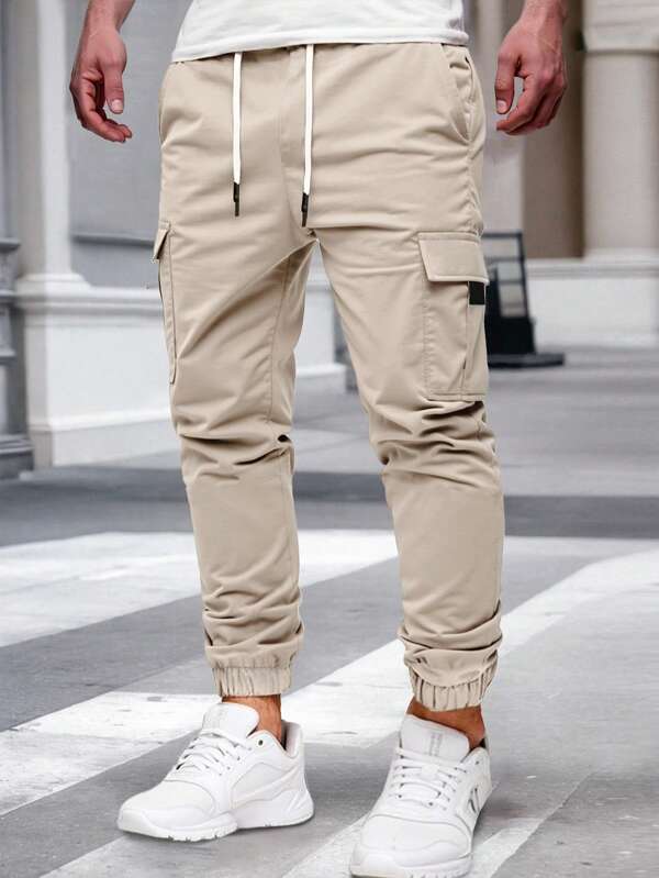 Manfinity EMRG Pantalon cargo à taille élastique et cordon de serrage pour hommes avec poches