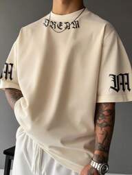 Manfinity EMRG Camiseta casual de manga corta de cuello redondo con estampado de letras de hombro caído para hombre, verano