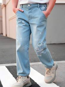 Jeans vaqueros desgastados de color claro versátiles y casuales para niños preadolescentes, adecuados para uso diario y exterior