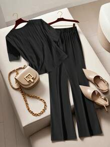 GlowEve Women's Solid Color Round Neck Short Sleeve T-Shirt And Full Length Pants 2 Pieces Set - Black - View 2