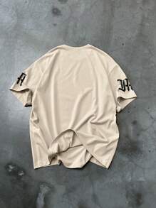 Manfinity EMRG Camiseta casual de manga corta de cuello redondo con estampado de letras de hombro caído para hombre, verano