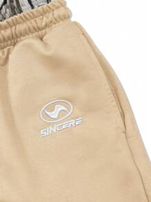 Manfinity EMRG Short décontracté pour hommes avec logo lettre brodé et cordon de serrage