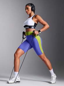 Powerista 女士蓝色拼布修身休闲运动短裤，适合日常健身和健身房，日常穿着运动短裤