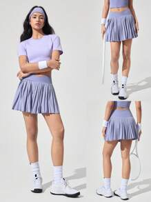 GLOWMODE Let's Play Sweat-Wicking Stretchy Mid-Rise Crossover Waist Pleated Tennis Skirt With Built-In Shorts Side Pockets Tennis Golf Daily - Mauve Mist - View 9
