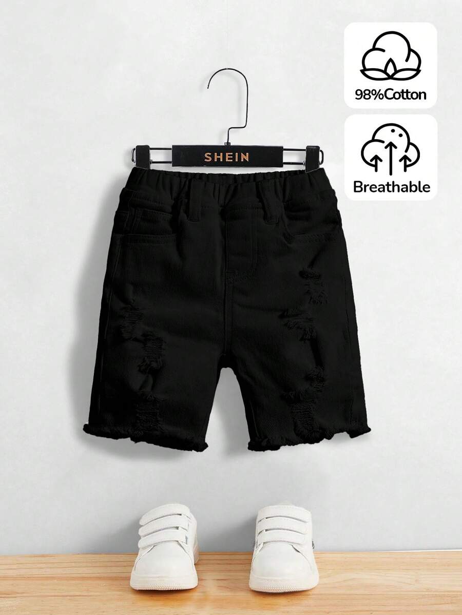SHEIN Pantalones cortos vaqueros negros skinny con roturas y deshilachados para niño, para primavera y verano - Negro - Ver 1