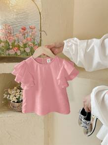 SHEIN LMoss Kids Camicetta casual avvitata in tinta unita con collo rotondo, da ragazza