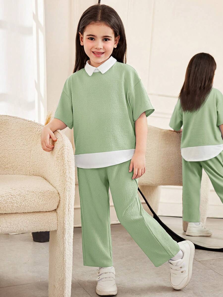 SHEIN Lässiger, eleganter Anzug für Kleine Mädchen im Büro mit lockerem Hemdkragen, übergroßer, überschnittener Schulter, kurzen Ärmeln, strukturiertem Spleiß-Farbblock-Bluse-Oberteil und gerade geschnittener Hose