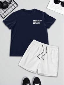 Manfinity Homme Men's Casual Outfit Including Navy Blue Short Sleeve T-Shirt With "Still Willing To Follow Freedom" Graphic Print, Paired With White Sports Shorts. Fashionable And Elegant, Also Makes A Great Gift For Boyfriend. Men's Shorts Set, Plus Size Men's 2-Piece Outfit, Travel Set.