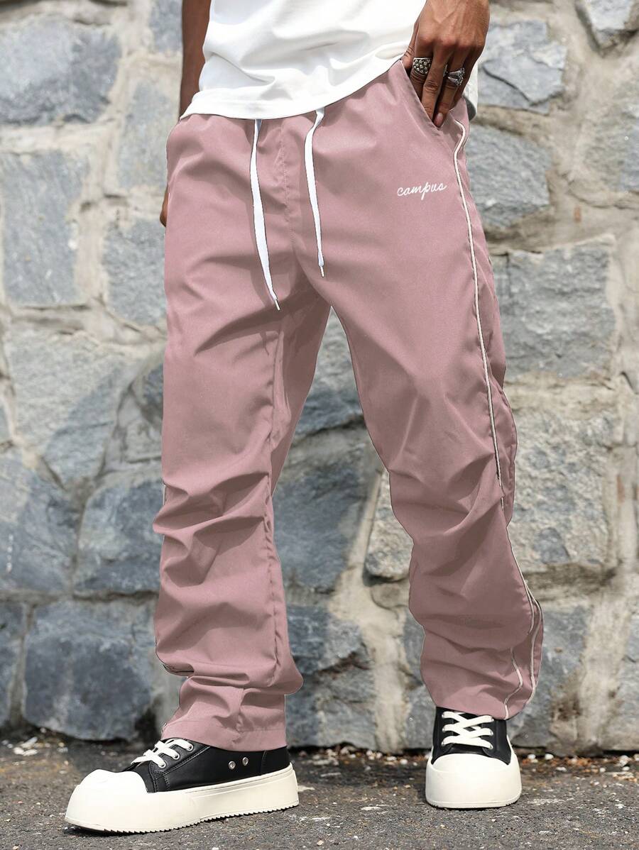 Manfinity Hypemode 男士简约前系带口袋字母印花休闲长裤，适合日常穿着 - 淺粉色 - 查看 1