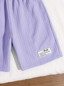 SHEIN Tenue décontractée de style coréen pour garçons préadolescents: pull-over à col montant avec fermeture éclair partielle, manches courtes et short tissé imprimé en 2 pièces