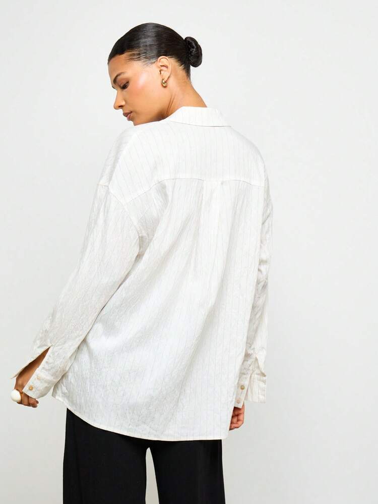 Camicetta oversize a maniche lunghe con bottoni in lino