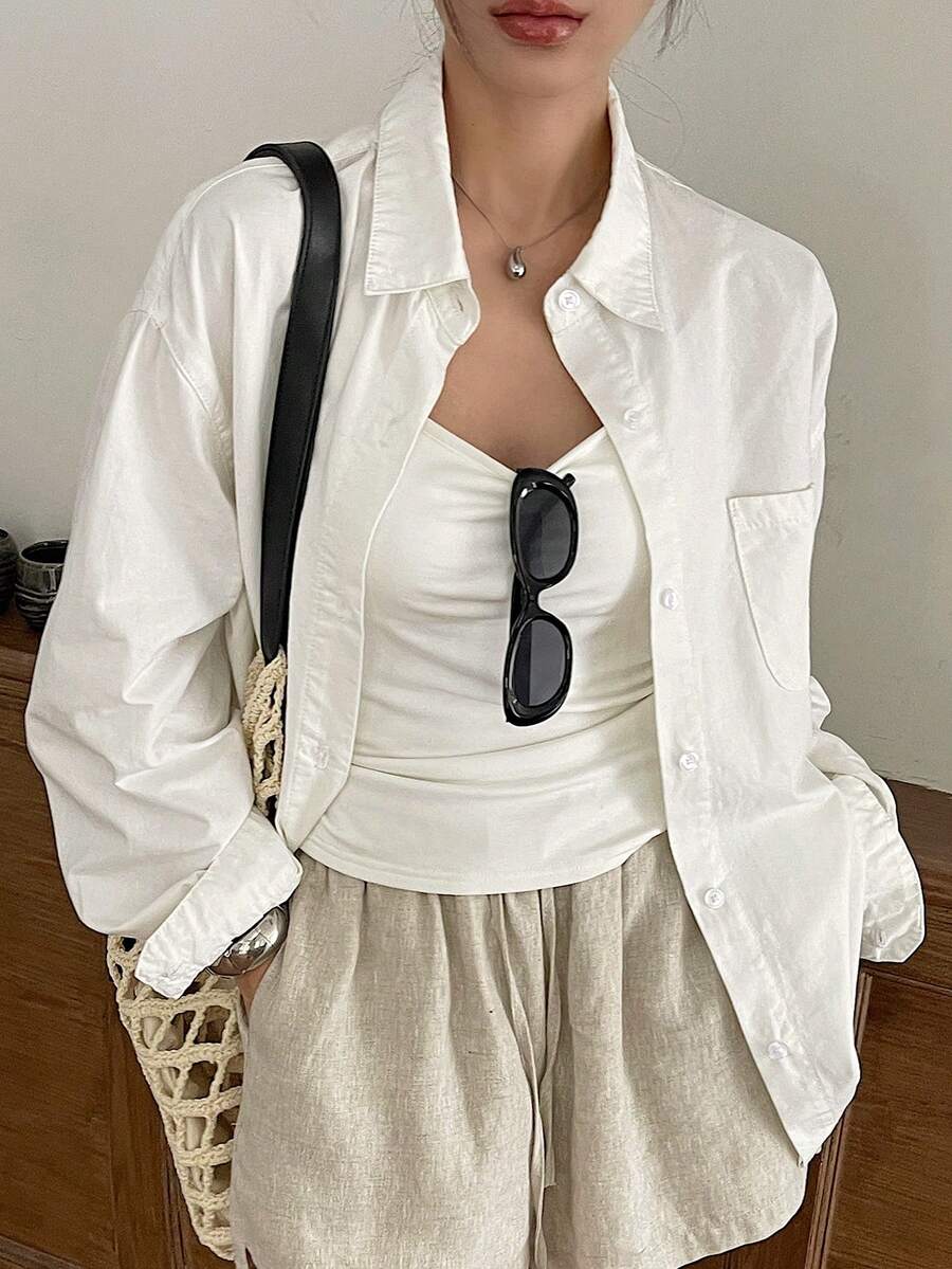 DAZY Blusa de manga larga de unicolor con un botón delantero y bolsillo para mujer