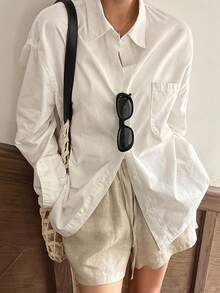 DAZY Blusa de manga larga de unicolor con un botón delantero y bolsillo para mujer