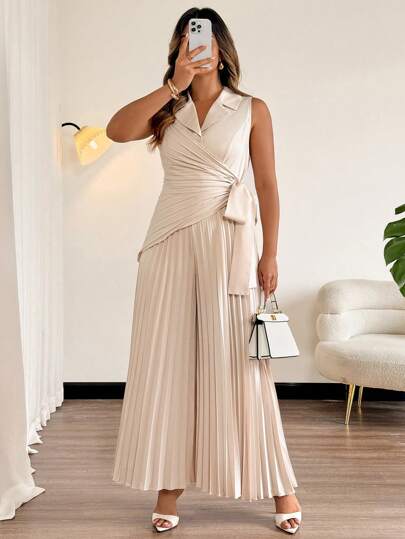 Flirla بدلة جمبسوت كاملة الحجم أحادية اللون مع تكدس أوراق التجييش بدون أكمام