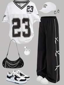 SHEIN Girlism Conjunto informal de 2 piezas para niñas preadolescentes con camiseta holgada de manga larga con estampado y pantalones con detalle de lazo a los lados - Blanco y Negro - Ver 1