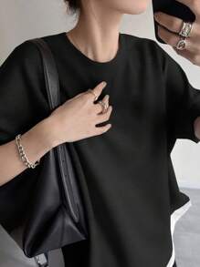 FRIFUL Women Summer Round Neck Patchwork Asymmetrical Hem Loose Colorblock Casual Short Sleeve T-Shirt Black White Top Asymmetrical Top Black And White Top Layered Top Two Tone Top