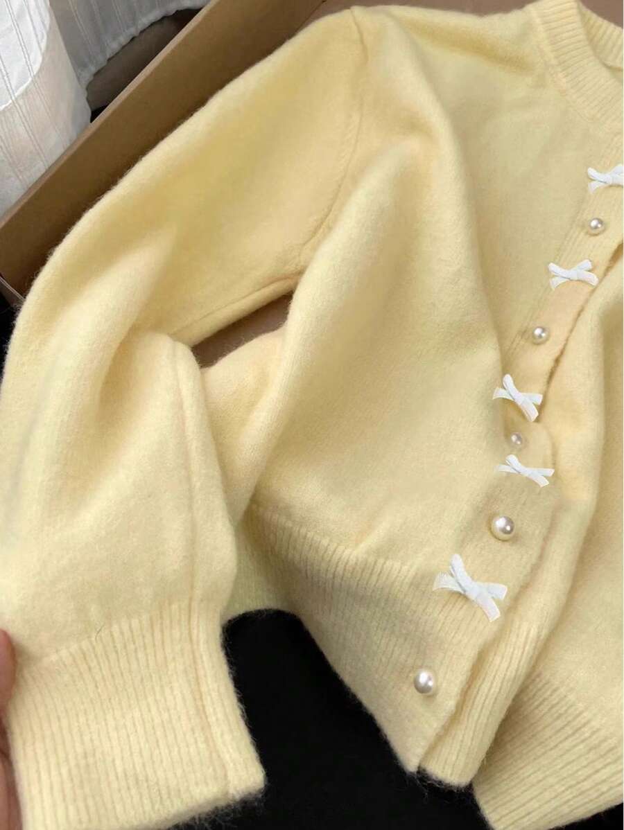 INAWLY 女式休闲纯色仿珍珠和蝴蝶结装饰落肩宽松黄色开衫 - 黃色 - 查看 1