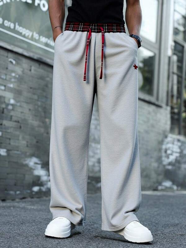 Manfinity Hypemode Pantalones casuales de hombre en unicolor con estampado a cuadros en patchwork, adecuados para el verano